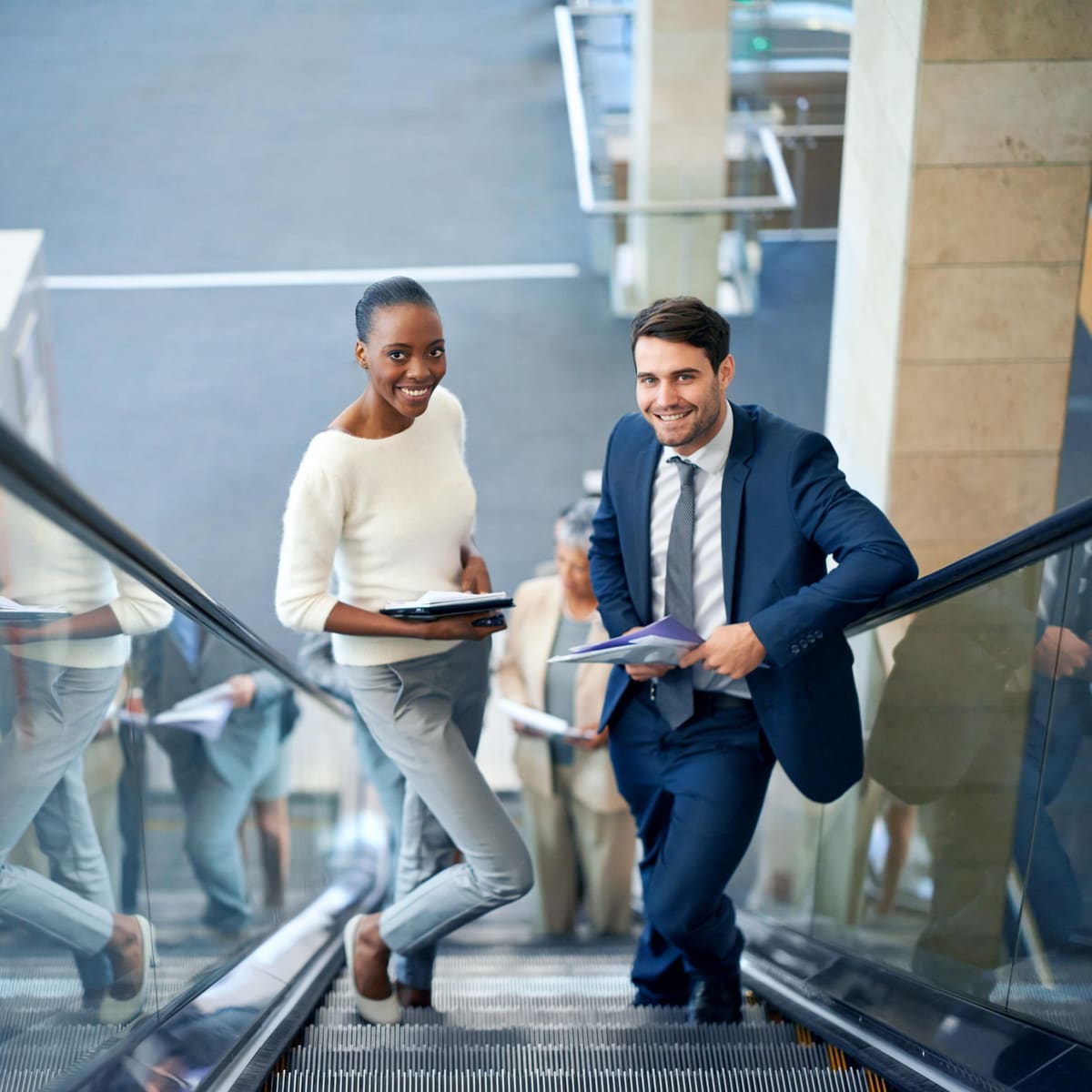 Business team climbing toward success together